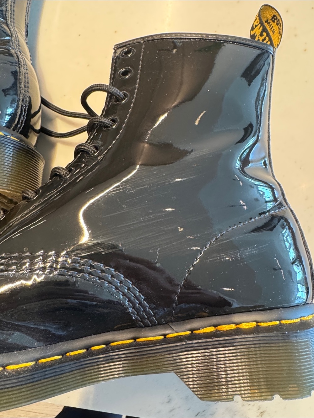 Dr. Martens Black Patent 8-Eye Lace-Up Boots with Yellow Stitching - Picture 5 of 11